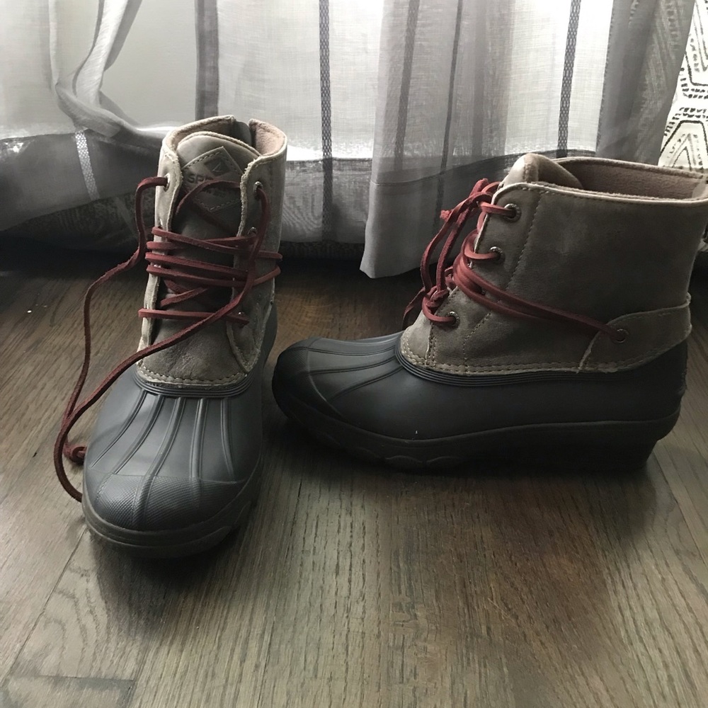 Never worn Sperry boots. Size 7.